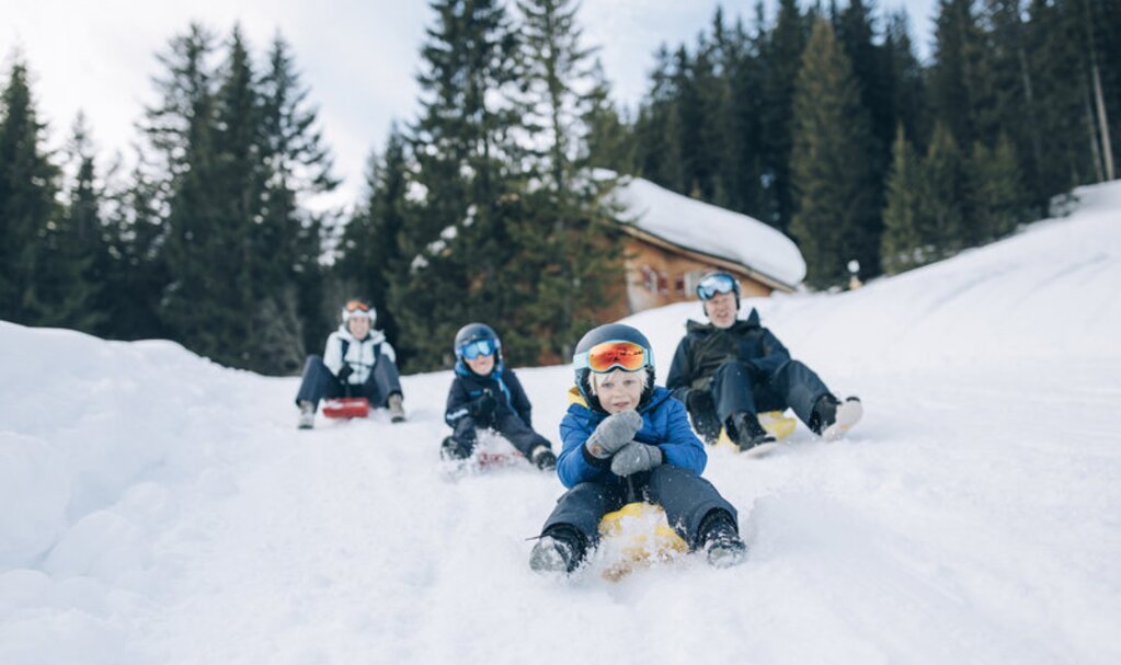 Tobogganing fun with the whole family at the toboggan run Oberlech
