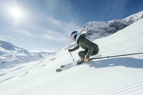 Skier on freshly prepared slopes
